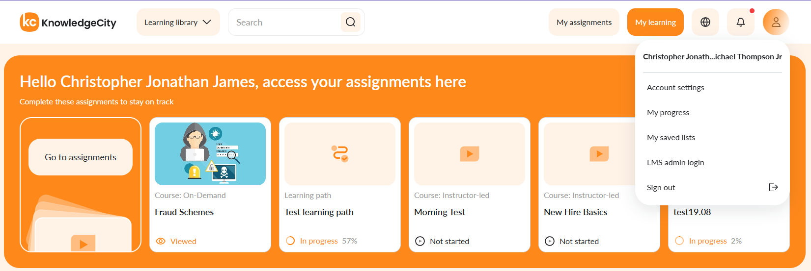 The account dropdown menu showing the student name